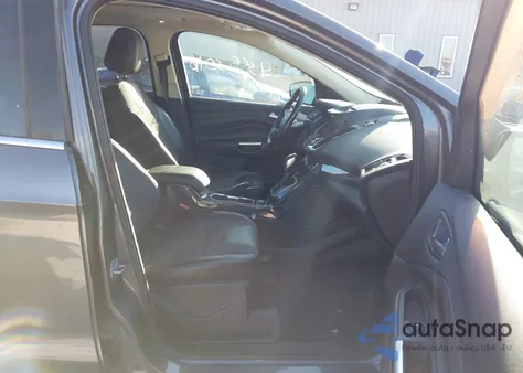 2014 Ford Escape Titanium z USA, uszkodzony, nr VIN 1FMCU9J90EUA00577